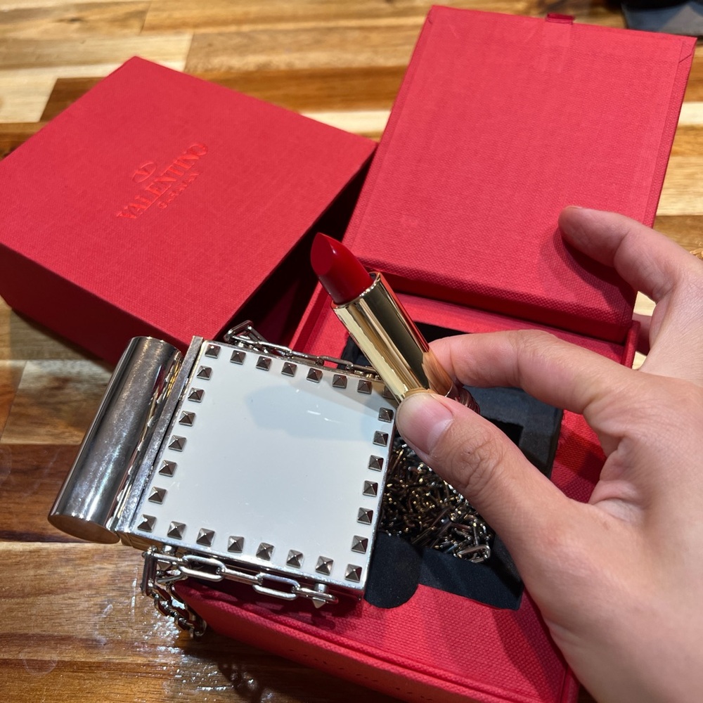 Valentino Red Lipstick with White and Silver Studded Clutch